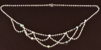A c1900 9ct white gold necklace set with seed pearls and turquoise, 5.2g, 38cm
