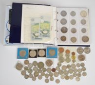 An amateur coin collection mostly contained in an album to include George III 1819 crown, Queen