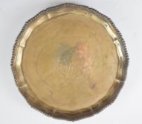 Elizabeth II hallmarked silver salver with shaped and gadrooned edge, raised on three scroll feet,