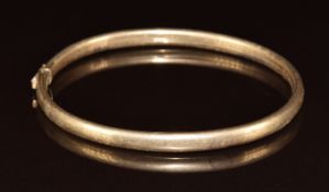 A 9ct gold bangle, 6.3g, 5.2 x 6cm