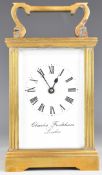 Charles Frodsham brass cased bevelled glass carriage clock, height 15cm