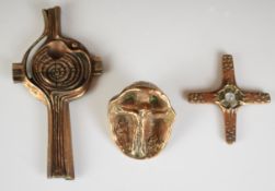 Three religious interest bronze crosses, one depicting the crucifixion, length of longest 18cm