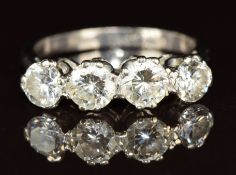 An 18ct white gold ring set with four diamonds of approximately 0.42ct, 0.44ct, 0.33ct and 0.35ct,