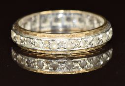 A 9ct gold eternity ring set with spinel, 2.8g, size N