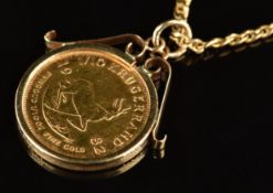 A 9ct gold pendant set with a 1982 1/10 krugerrand (4.1g) on 9ct gold chain, 3.5g, 44cm
