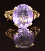 A 9ct gold ring set with an oval cut amethyst, 2.8g, size M