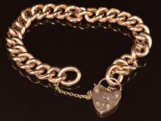A c1920 9ct rose gold curb link bracelet with heart padlock clasp, 18g, 17cm
