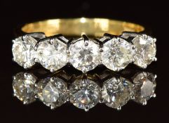 An 18ct gold ring set with five diamonds, each approximately 0.3ct, 4.5g, size N