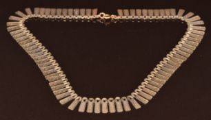 A 9ct gold Cleopatra style necklace with engraved decoration, 18.5g, 38.5cm