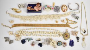 A collection of jewellery including Navajo silver bangle marked 'Sterling Bell' set with