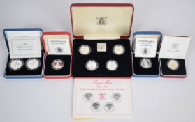 Nine Royal Mint silver proof coins comprising 1984-1987 £1 set of four, 1989 £2 two coin set, 1988