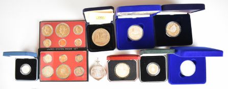 Royal Mint cased proof silver coins comprising 2005 Trafalgar crown, 2000 Queen Elizabeth the