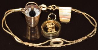 A 9ct gold bracelet, 9ct gold St Christopher charm, 9ct gold Champagne bucket charm (5.5g) and a 14k
