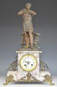 19th century figural mantel clock with marble and gilt metal mounted case surmounted by a person