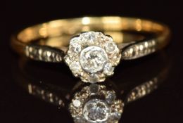 An 18ct gold ring set with diamonds in a platinum setting, 2.5g, size Q