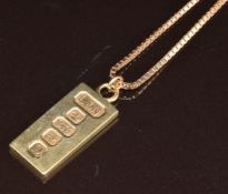 A 9ct gold ingot pendant on 9ct gold chain made up of box links, 17.6g, 64cm