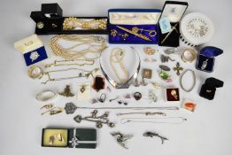 A collection of jewellery, some silver including two napkin rings, Celtic brooch, earrings,