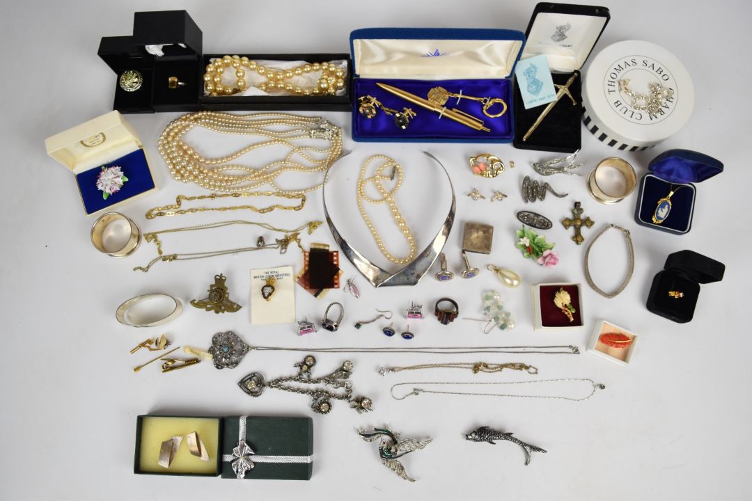 A collection of jewellery, some silver including two napkin rings, Celtic brooch, earrings, - Image 1 of 5
