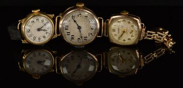Three gold ladies wristwatches comprising an 18ct gold example on black fabric strap and two 9ct