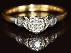 An 18ct gold ring set with a diamond in a platinum setting, 2.5g, size L
