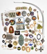 A collection of jewellery including six micro mosaic boxes, photograph frame, brooches including