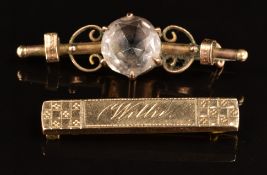 Two yellow metal brooches, one engraved 'Willie' and the other set with an amethyst, 5.3g
