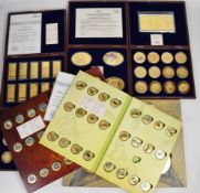 Seven various gold plated picture coin sets, some in fitted wooden boxes, some in presentation