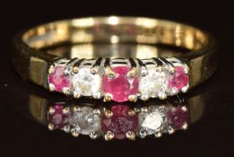 A 9ct gold ring set with spinel and diamonds, 1.9g, size K