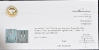 An 18ct white gold ring designed by Marco Oldani for John Rasmussen set with diamonds, the largest