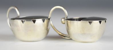 Pair of Carl Poul Petersen (apprenticed to Georg Jensen) silver salts with scroll handles, marked to