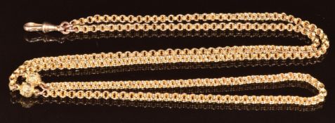 A c1900 9ct gold watch chain/ guard chain made up of circular ridged links and two spherical