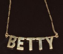 A 9ct gold 'Betty' necklace, 2.6g