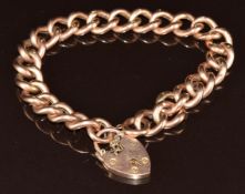 A 9ct rose gold curb link bracelet with heart padlock clasp, 15g, 19cm