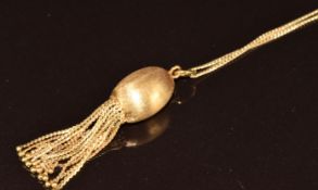 An 18ct gold pendant with textured finish and tassel decoration (4.5cm) on 18ct gold chain, 5.6g,