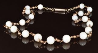 Edwardian 9ct gold necklace set with opal beads, 17.3g, 43cm