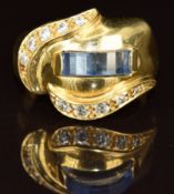 An 18ct gold ring set with paste and cubic zirconia, 6g, size M