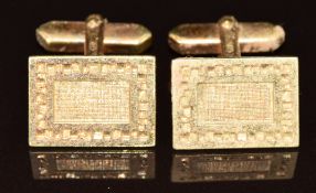 A pair of 9ct gold cufflinks with textured decoration, 7.6g