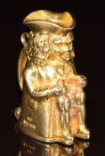 A 9ct gold charm in the form of a toby jug opening to reveal wine and sandwiches, 10.7g, 2.5cm