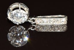 Art Deco platinum pendant set with a transitional cut diamond of approximately 0.7ct and five