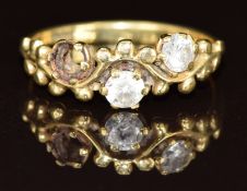An 18ct gold ring set with cubic zirconia (one stone missing), 3g, size N