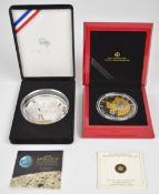 Two 5 oz silver coins comprising United States Mint 2109 Apollo 11 and Royal Canadian Mint 25th