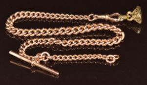 A 9ct gold watch chain / Albert made up of graduated curb links, 35.5g, 34cm