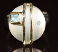 A 14k white gold ring set with a topaz and diamond with applied yellow gold decoration, 6.1g, size