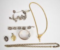 A collection of silver jewellery including charm bracelet, Welsh dragon bracelet, bangle, curb