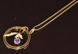 Edwardian 9ct gold pendant set with an amethyst and seed pearls (2.3g) on 9ct gold chain, 5g, 45cm