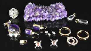 A pair of 9ct white gold earrings each set with diamond of approximately 0.1ct, a pair of 9ct gold