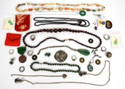 A collection of jewellery including silver pendant, three silver rings, two micro mosaic brooches,