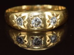 A c1900 18ct gold ring set with three diamonds, 2g, size K