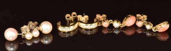 A pair of 18ct gold earrings set with diamonds (2.4g) and two pairs of 9ct gold earrings, one pair