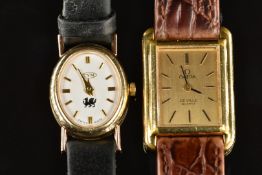 Two ladies wristwatches Omega De Ville with black hands, two-tone hour markers, gold dial and quartz